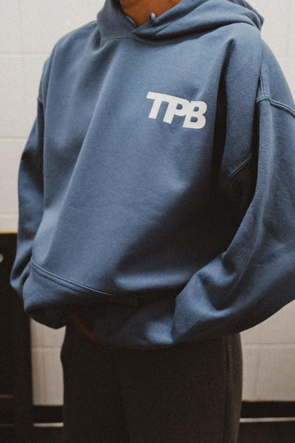 Branded indigo and white Unisex Hoodie + Free Tray Bake