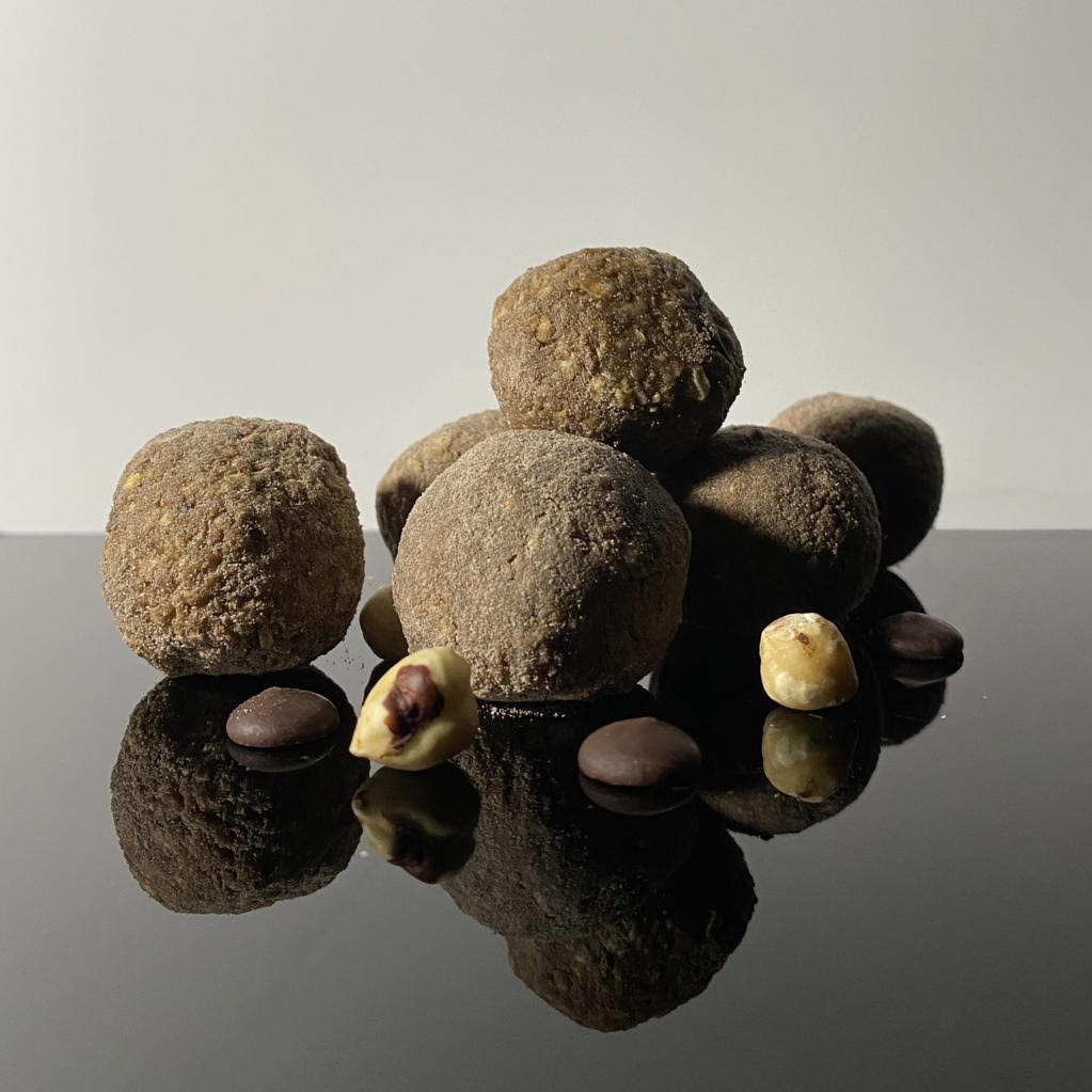 Dark Chocolate And Peanut Protein Balls With a Hazelnut Centre